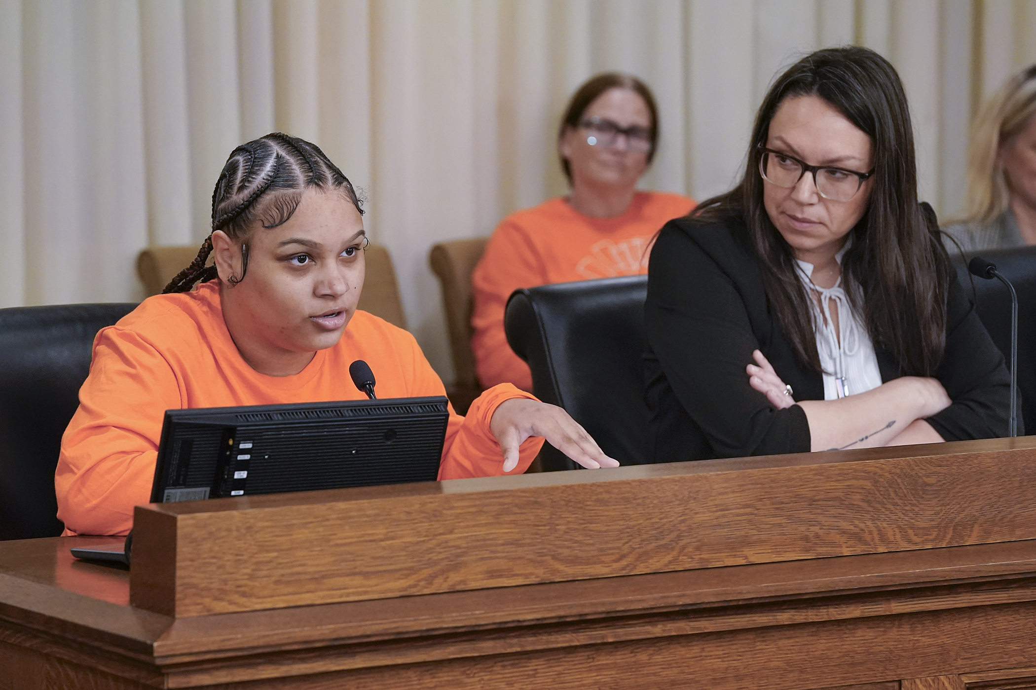 Tatyana Haynes shares her homelessness experience with the House Capital Investment Committee Tuesday in support of HF4736 and HF4737. Rep. Heather Keeler sponsors the bills to fund an emergency shelter facility account. (Photo by Michele Jokinen)